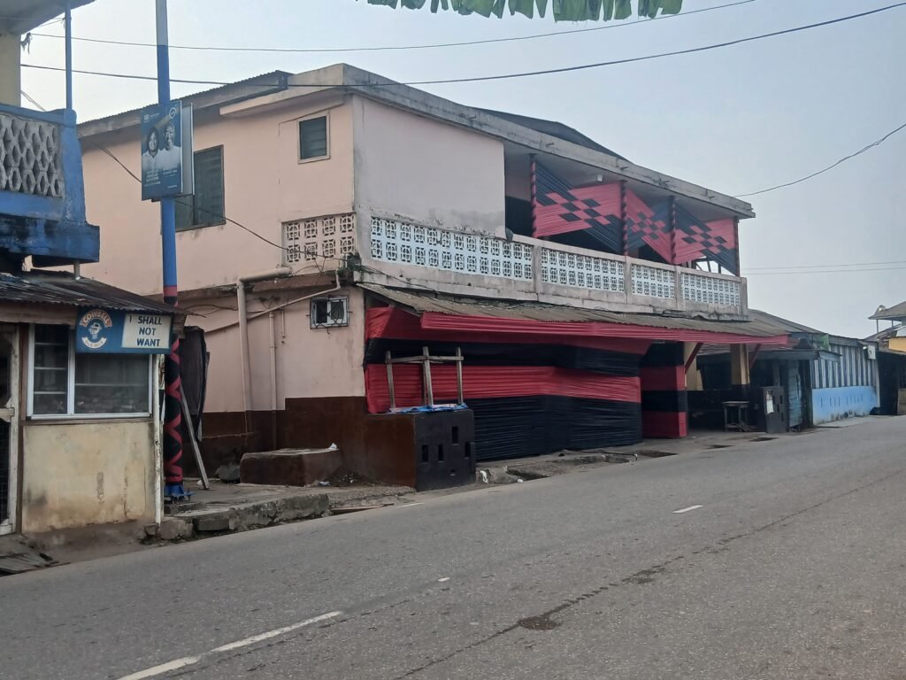 One of the residences of Dr. Nana Ama Amissah III adorned in red and black as the bereaved family mourns her passing